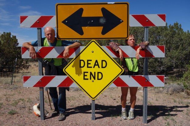Fellow marchers Ed Fallon and Shira Wohlberg ham it up on the road to Taos