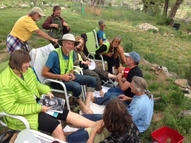 Marchers getting foot bath and massage by friends at New Buffalo